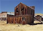 Facade of a log cabin in an old rural town