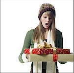 Girl looking at Christmas presents