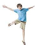 Portrait of a boy jumping with joy