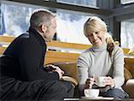 Man and woman sitting together and chatting