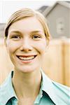 Close-up of a young woman smiling