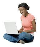 Portrait of a young woman using a laptop