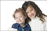 Portrait of two sisters smiling