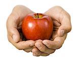 Close-up of hands holding an apple