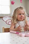 Girl in Costume Drinking Milk