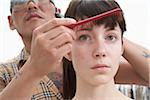 Woman Having Hair Styled