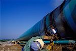 Welder Working on Natural Gas Pipeline