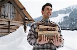 Man Carrying Chopped Wood