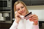 Woman telephone banking