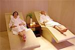 Two young women relaxing at a spa together
