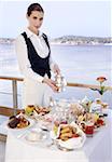 Waitress with breakfast table