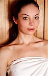 Young woman enjoying a sauna