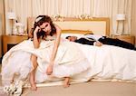 Bride disappointed with groom passed out on hotel bed