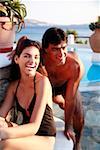 Couple at seaside swimming pool