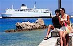 Young couple at ferry dock