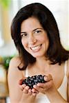 Woman Holding Blueberries