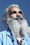 Close-up of a sadhu looking away