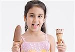 Portrait of a girl holding two ice creams