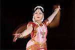 Young woman performing Bharatnatyam