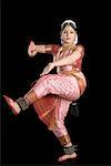 Portrait of a young woman performing Bharatnatyam