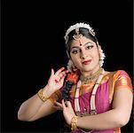 Portrait of a young woman performing Bharatnatyam