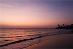 Panoramic view of the sea at dusk Morjim Beach, Goa, India