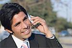 Close-up of a businessman talking on a mobile phone