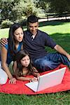 Family at Park, Using Laptop