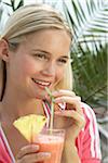 Woman Drinking Fruit Beverage