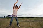 Woman Playing with Hula-Hoop