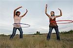 Friends Playing with Hula-Hoops