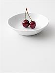 Bowl with Two Bing Cherries