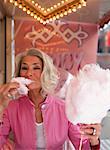 Portrait of Woman Eating Cotton Candy