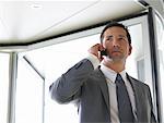 Businessman Using Cellular Telephone