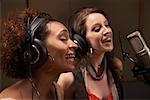Women Singing in Recording Studio