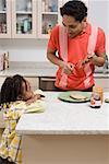 Father and son in the kitchen