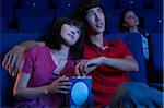 Couple in Movie Theatre