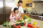 Father and Daughter Preparing Dinner