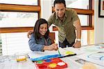 Father Watching Daughter Paint