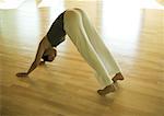 Woman doing downward dog pose