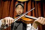 Boy playing violin