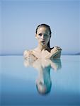 Woman in pool outdoors