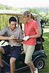 Couple with Golf Cart