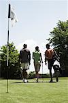 Golfers Walking off Green