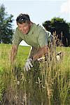 Golfer Searching for Lost Ball