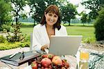 Portrait of Woman with Laptop Outdoors