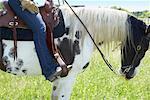 Woman Riding Horse