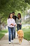 Family Walking Dog