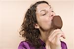 Woman Eating Ice Cream Bar