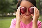 Girl Holding Plums